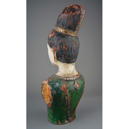 535 - An Asian decorative painted wood bust of a young woman, with jewel decoration, approx 41cm high