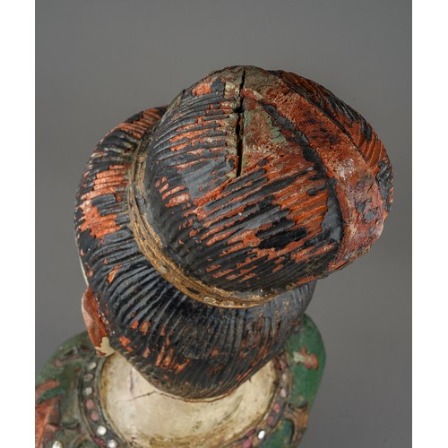 535 - An Asian decorative painted wood bust of a young woman, with jewel decoration, approx 41cm high