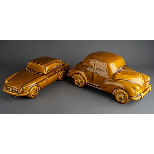 576 - Two large Dartmouth style mustard models of cars to include a MG and Morris Minor 1000 (both with al... 