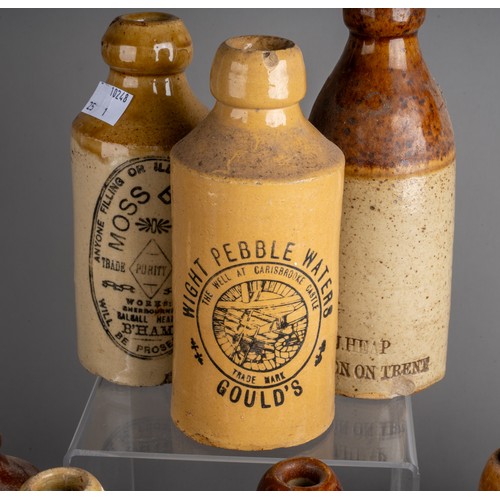 586 - Thirsty-Six stoneware ginger beer bottles, mostly Birmingham, Manchester, all with black transfer la... 