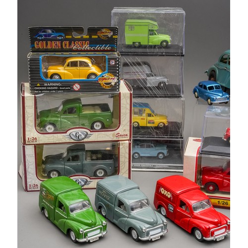 591 - A collection of various Morris Minor diecast vehicles and ceramic ornaments plus a tray of 6 Oxford ... 