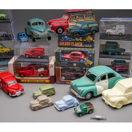 591 - A collection of various Morris Minor diecast vehicles and ceramic ornaments plus a tray of 6 Oxford ... 