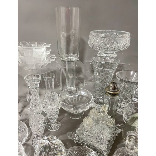 531 - A collection of cut and moulded glass to include: wine glasses, bowls, vases, condiment set, paperwe... 