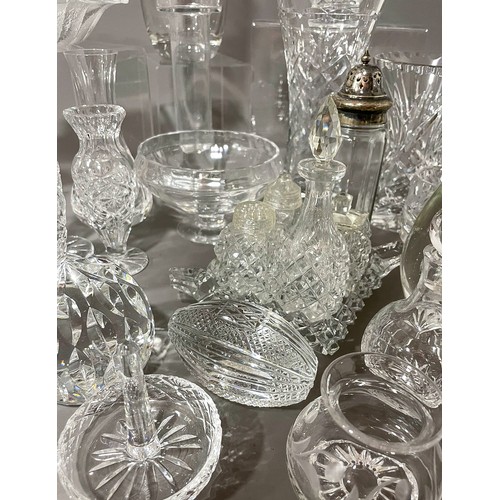 531 - A collection of cut and moulded glass to include: wine glasses, bowls, vases, condiment set, paperwe... 