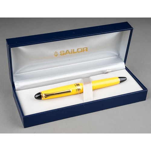 359 - A group of three Japanese Sailor fountain pens in yellow, purple or red, all with 14k white or yello... 