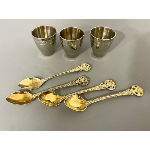 234 - A set of four Russian 916 standard silver gilt ornate coffee spoons, the bowls stamped, gross weight... 