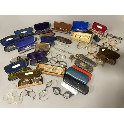 85 - A collection of various vintage spectacles and glasses, some gold