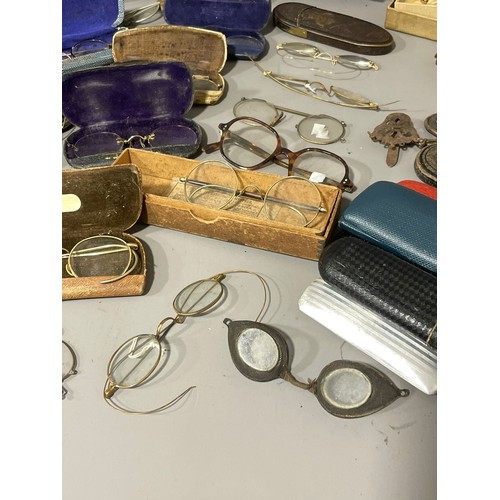 85 - A collection of various vintage spectacles and glasses, some gold