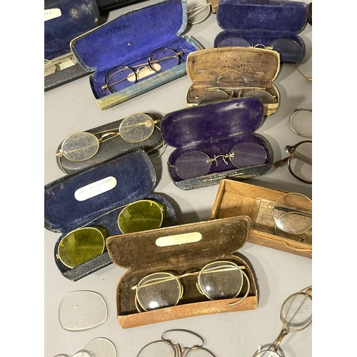 85 - A collection of various vintage spectacles and glasses, some gold