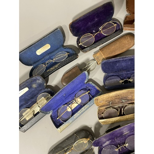 85 - A collection of various vintage spectacles and glasses, some gold