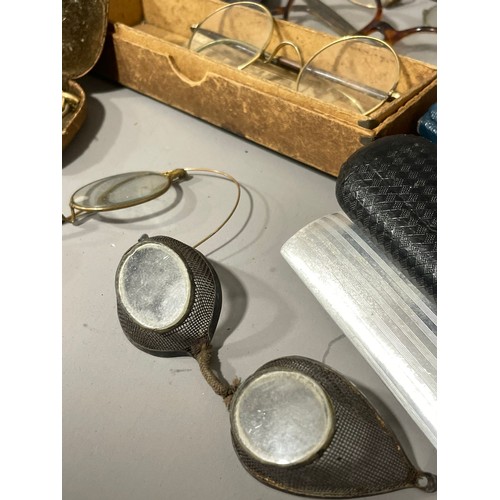 85 - A collection of various vintage spectacles and glasses, some gold