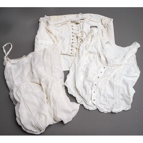 193 - Assorted vintage clothing mainly cotton including girdles, bloomers, night gowns, chemises, aprons, ... 