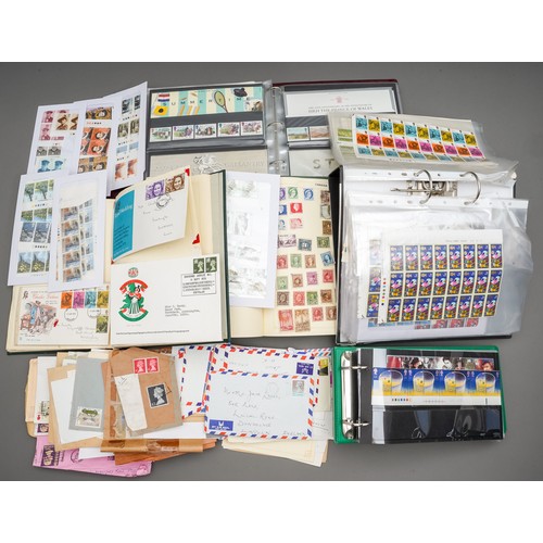 87 - A large stamp collection comprising of an album of mint presentation packs, 1990-4 approximately, a ... 