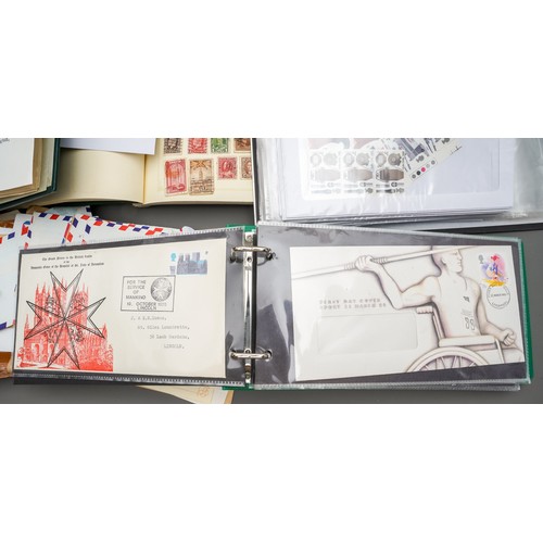 87 - A large stamp collection comprising of an album of mint presentation packs, 1990-4 approximately, a ... 