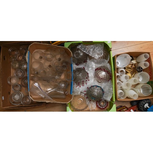 120 - A large collection of assorted glass to include condiment jars, chandelier / oil lamp parts, glass o... 