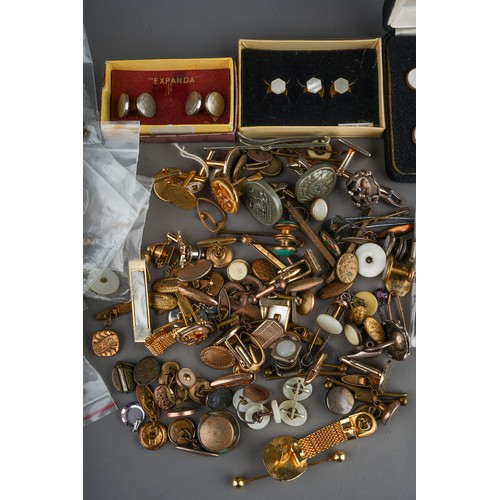 96 - A quantity of cufflinks and dress studs, including enamelled sporting interest, printed and reverse ... 