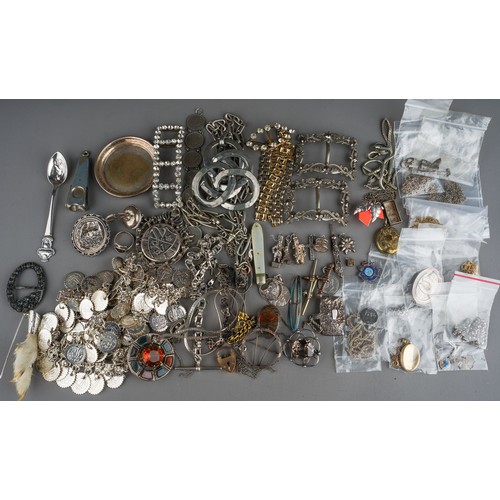 111 - A collection of silver and white metal jewellery, including chains, watch chains, brooches, pendants... 