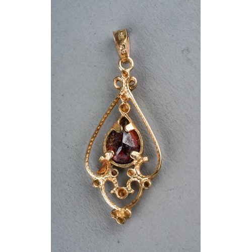 2 - A 9ct yellow gold and garnet pendant, gross weight approx 1g; together with a silver and green glass... 