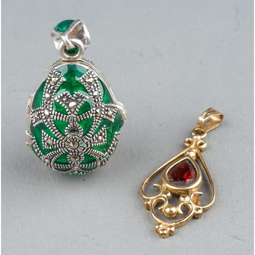 2 - A 9ct yellow gold and garnet pendant, gross weight approx 1g; together with a silver and green glass... 