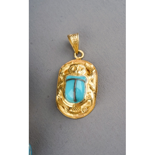 5 - An Egyptian yellow gold bracelet, with seven scarab beetle links set with turquoise glass, approx 18... 