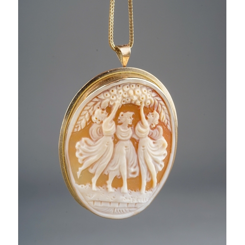 7 - An 9ct yellow gold and shell oval cameo brooch, carved depicting three maidens, approx 5.5cm over lo... 