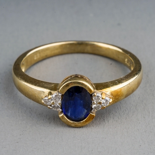 11 - A 9ct yellow gold synthetic sapphire and diamond dress ring, size M, total gross weight approx 2.2g