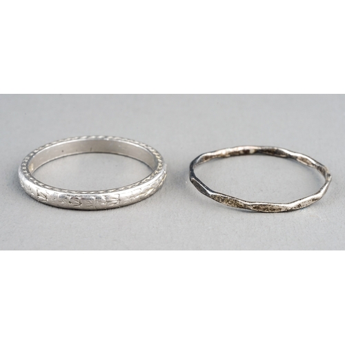 16 - A platinum band, engraved detail, size M, gross weight approx 3.6g; together with a white metal ring... 