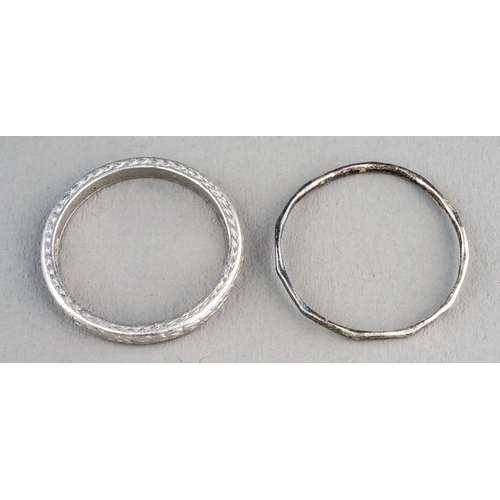 16 - A platinum band, engraved detail, size M, gross weight approx 3.6g; together with a white metal ring... 