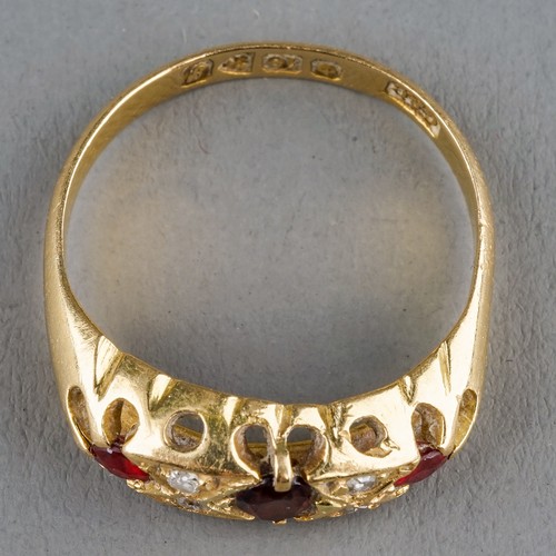 19 - An Edwardian 18ct yellow gold garnet and diamond ring, size N1/2, hallmarked Chester 1909, gross wei... 