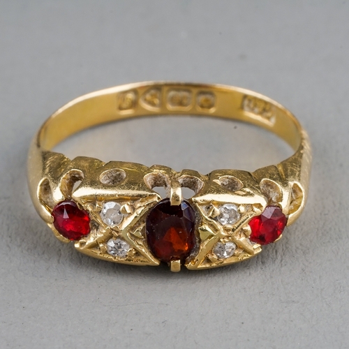 19 - An Edwardian 18ct yellow gold garnet and diamond ring, size N1/2, hallmarked Chester 1909, gross wei... 