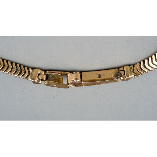 25 - A 9ct yellow gold ladies Rotary wristwatch, circular dial, on a 9ct gold snake-link bracelet strap, ... 