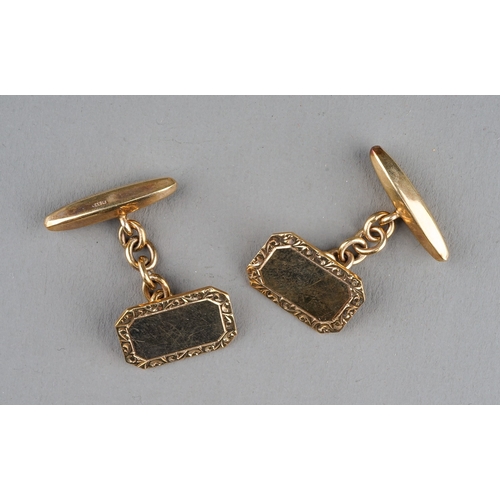 28 - A pair of 9ct yellow gold cufflinks, canted rectangular with chased border, hallmarked Birmingham 19... 