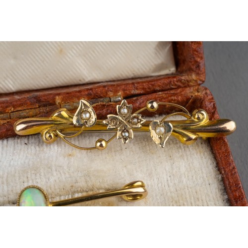 31 - A collection of four Edwardian 9ct yellow gold bar brooches, including seed pearl, opal, peridot, to... 