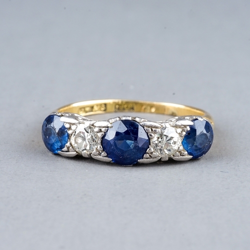 36 - An early 20th century 18ct yellow gold sapphire and diamond ring, set with three round-cut sapphires... 