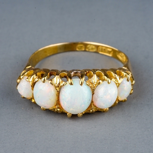 44 - A Victorian 18ct yellow gold and opal five-stone ring, set with five graduated oval cabochon opals, ... 