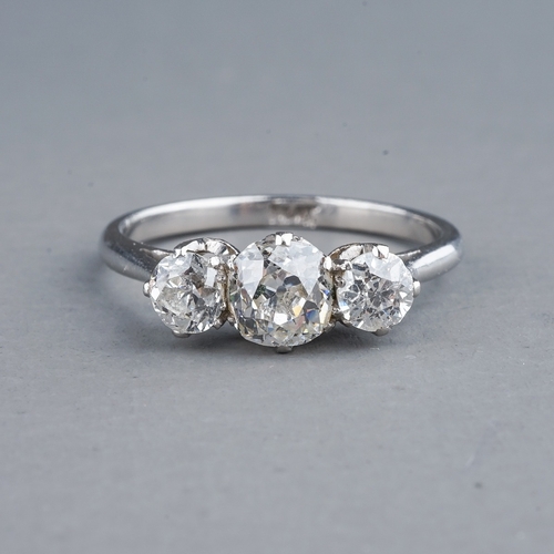 52 - A platinum and diamond three stone ring, set with old-cut diamonds, estimated total diamond weight a... 