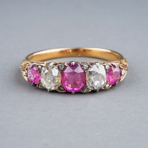 53 - A yellow gold ruby and diamond five-stone ring, set with three graduated rubies and two old-cut diam... 