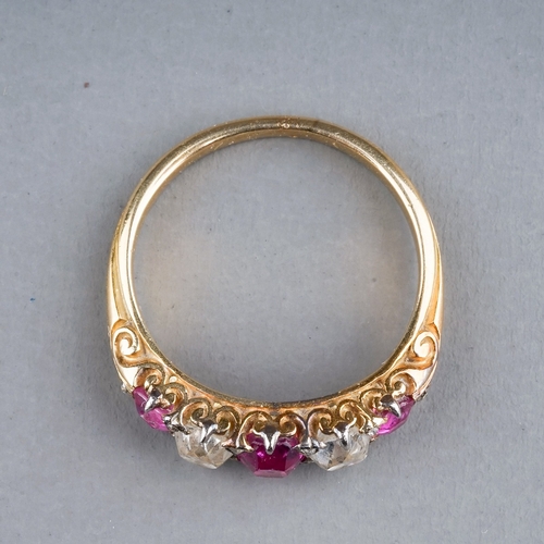 53 - A yellow gold ruby and diamond five-stone ring, set with three graduated rubies and two old-cut diam... 