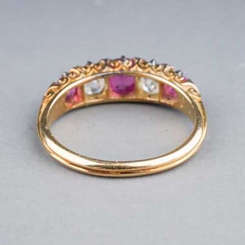 53 - A yellow gold ruby and diamond five-stone ring, set with three graduated rubies and two old-cut diam... 