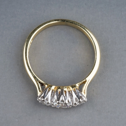 56 - An 18ct yellow gold and diamond three-stone ring, the centre round brilliant-cut diamond approx 0.40... 