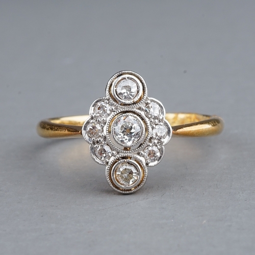 57 - An Edwardian 18ct yellow gold and diamond dress ring, set with old-cut and single-cut stones, size L... 