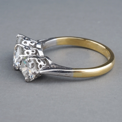 62 - A yellow gold and diamond three-stone ring, set with round brilliant-cut diamonds, centre stone appr... 