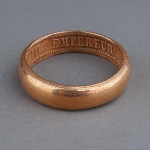 75 - A rose gold ring, of plain design, the inner shank inscribed 'NAPOLEON EMPEREUR III 1861', size R, g... 