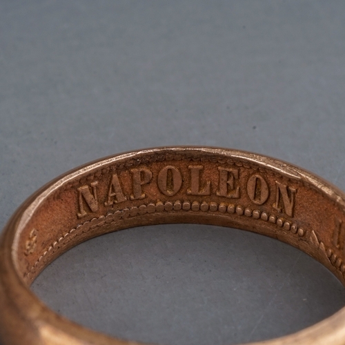 75 - A rose gold ring, of plain design, the inner shank inscribed 'NAPOLEON EMPEREUR III 1861', size R, g... 