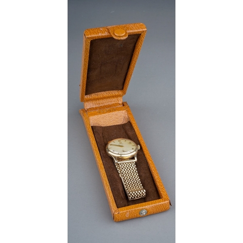 76 - A gentleman's 9ct yellow gold Omega wristwatch, 30mm dial with baton and Arabic numerals, 35mm case,... 