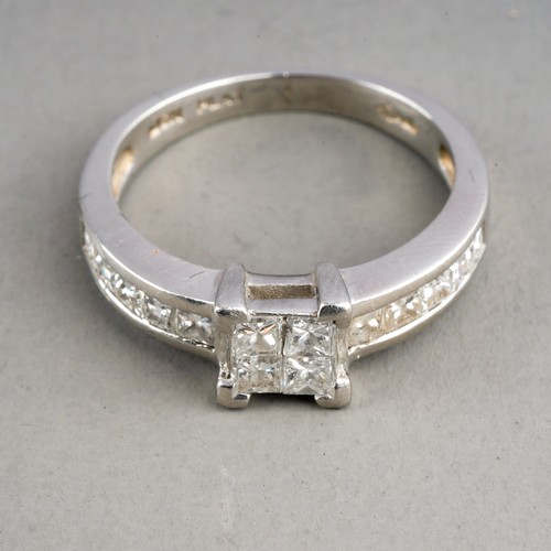 83 - A platinum and diamond ring, set with four princess-cut diamonds in a square settings, set with ten ... 