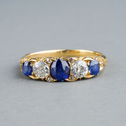 85 - An Edwardian yellow gold sapphire and diamond five-stone ring, size L, unmarked assessed as approx 1... 