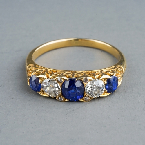 85 - An Edwardian yellow gold sapphire and diamond five-stone ring, size L, unmarked assessed as approx 1... 