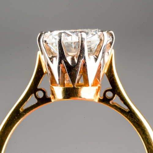 87 - An 18ct yellow gold and diamond solitaire ring, the round brilliant-cut diamond approx 1.5cts, size ... 