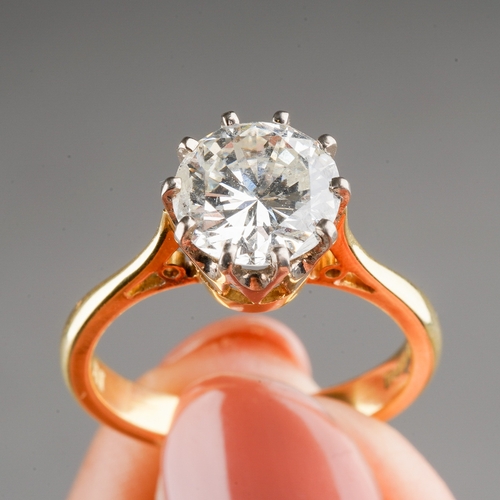 87 - An 18ct yellow gold and diamond solitaire ring, the round brilliant-cut diamond approx 1.5cts, size ... 